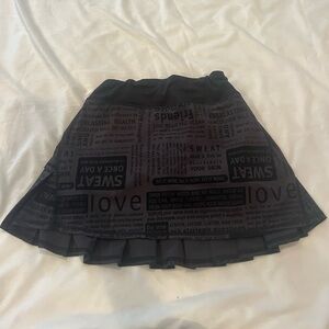 Lululemon skirt, newspaper print, size 2 tall